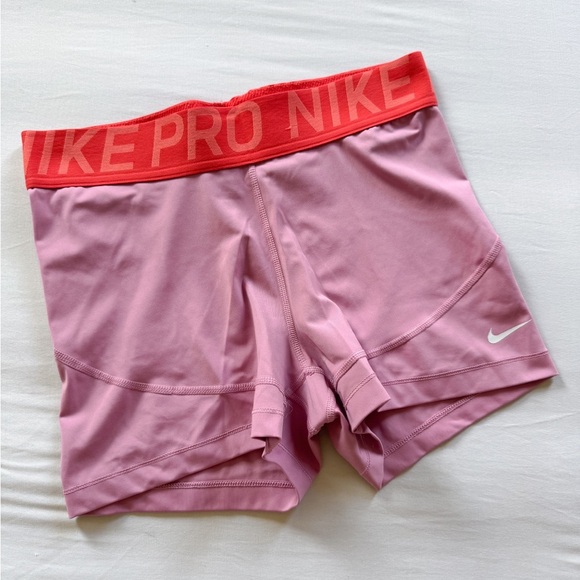 Nike Pink and Red Athletic Shorts with Compression Fit - Picture 1 of 3